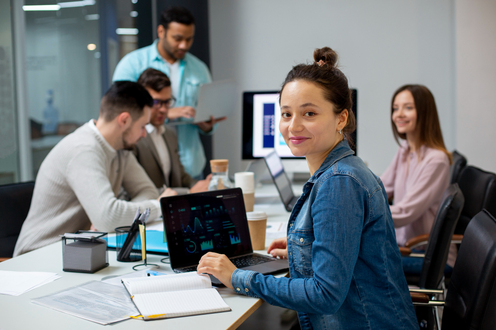 Business professionals working together in a modern office, representing various corporate roles